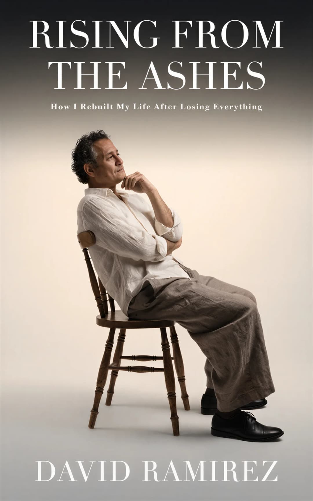 AI book cover generator biography prestige portrait: contemplative man seated on wooden chair in neutral studio setting for 'Rising from the Ashes'